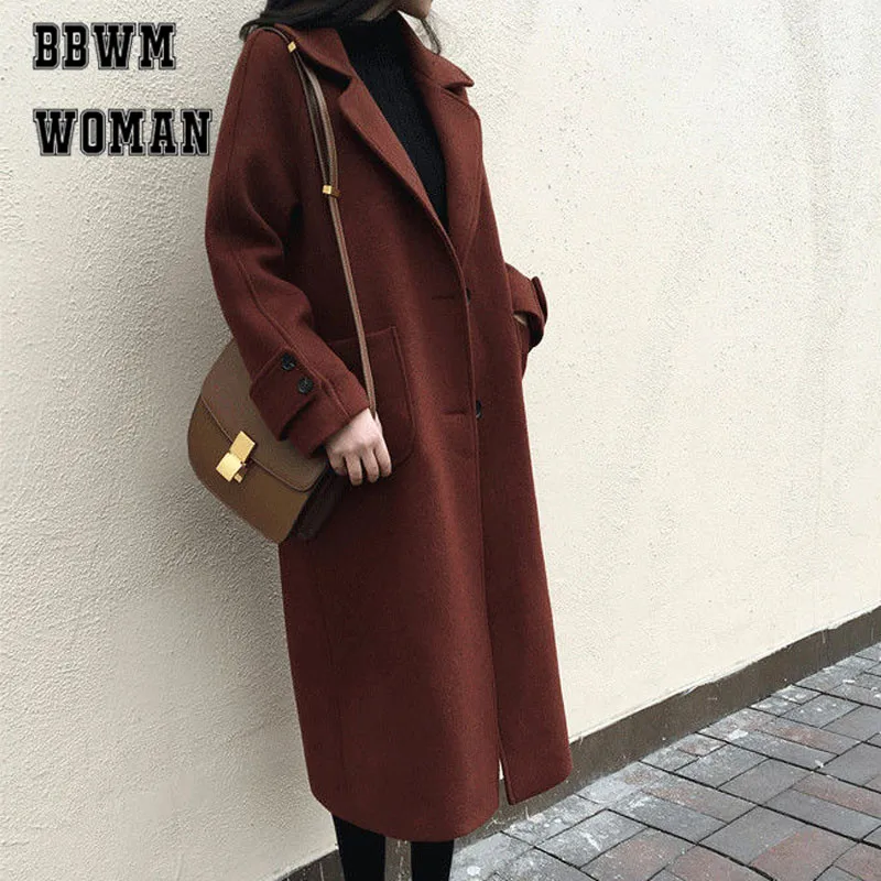 Женская осенне зимняя куртка с длинным отложным воротником и карманами