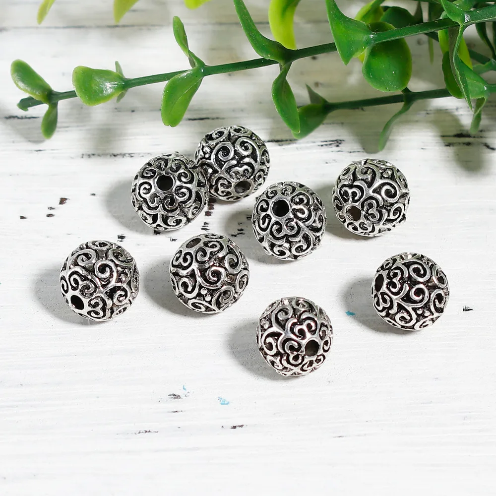 Бусины DoreenBeads из цинкового сплава серебряного цвета круглая филигрань