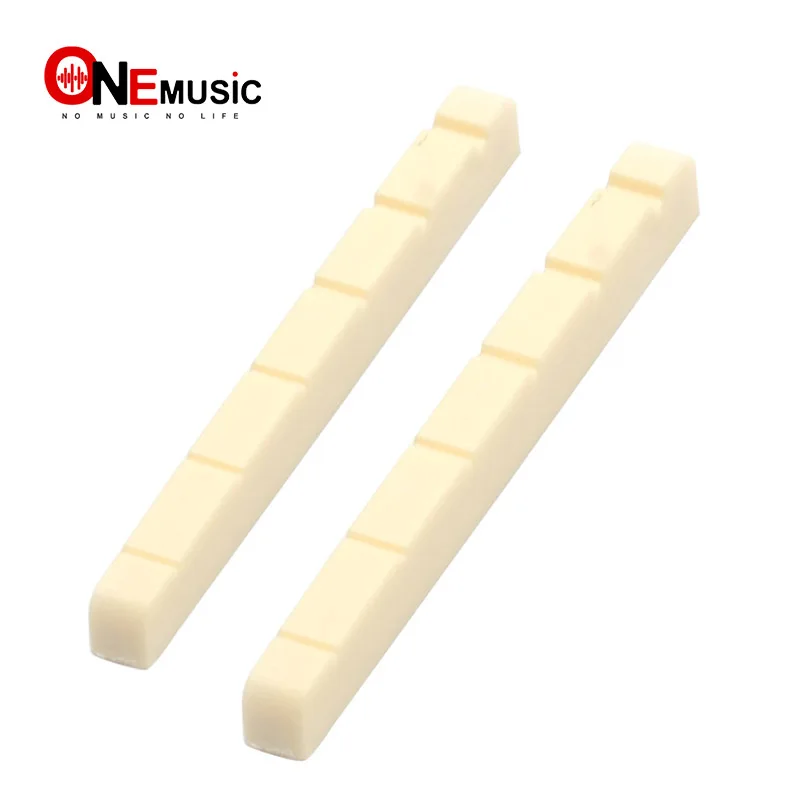 

Wholesale 50pcs Ivory Plastic R400 43x3.4x4.6-3.8MM Electric Guitar Nut Electric Guitar Parts Electric Guitar DIY Parts