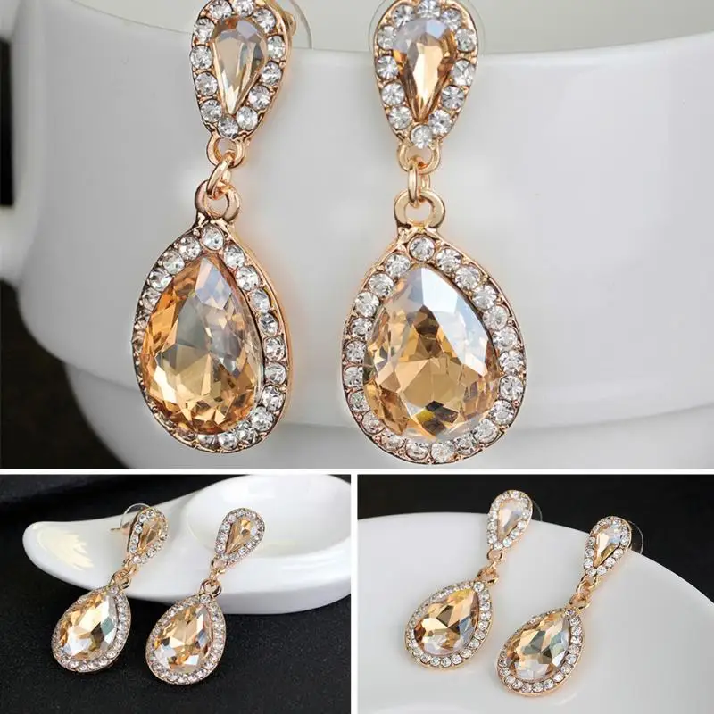 Женские ажурные длинные серьги подвески цвета шампанского с кристаллами