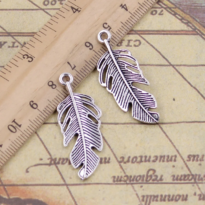 

12pcs Charms Feather 40x16mm Antique Silver Color Pendants Making DIY Handmade Tibetan Finding Jewelry For Bracelet