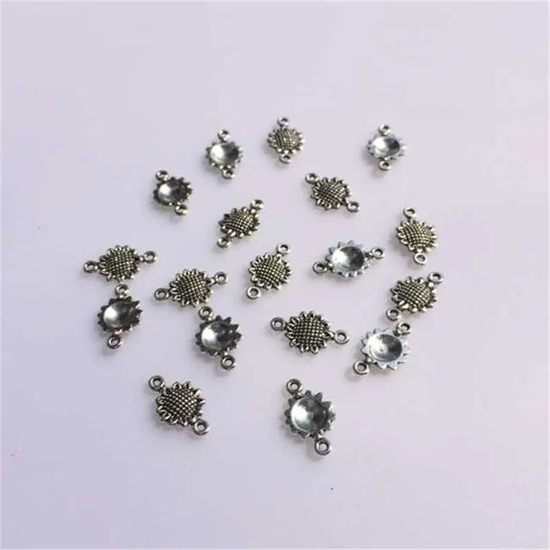 

Antique Bronze Silver Sunflower beads with Loop Connectors Charm For Gift Jewelry 10x16mm 100pcs T375 Lead Nickel Free
