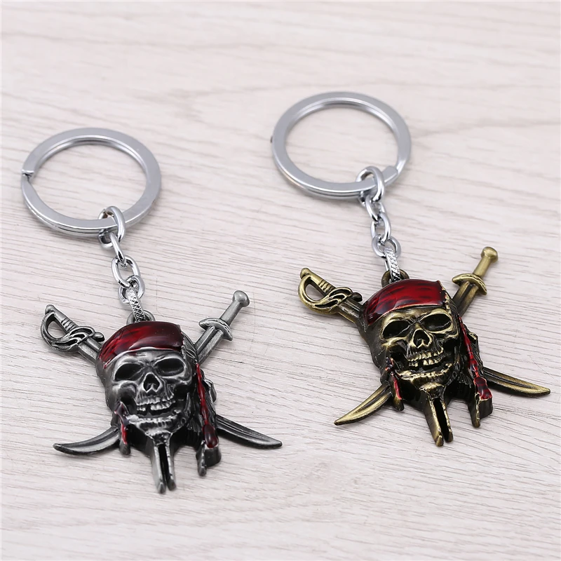 

J store Novelty Pirates of the Caribbean Keychain Captain Jack Sparrow Mask Skull With Crossbones Key Chain Holder Chaveiro