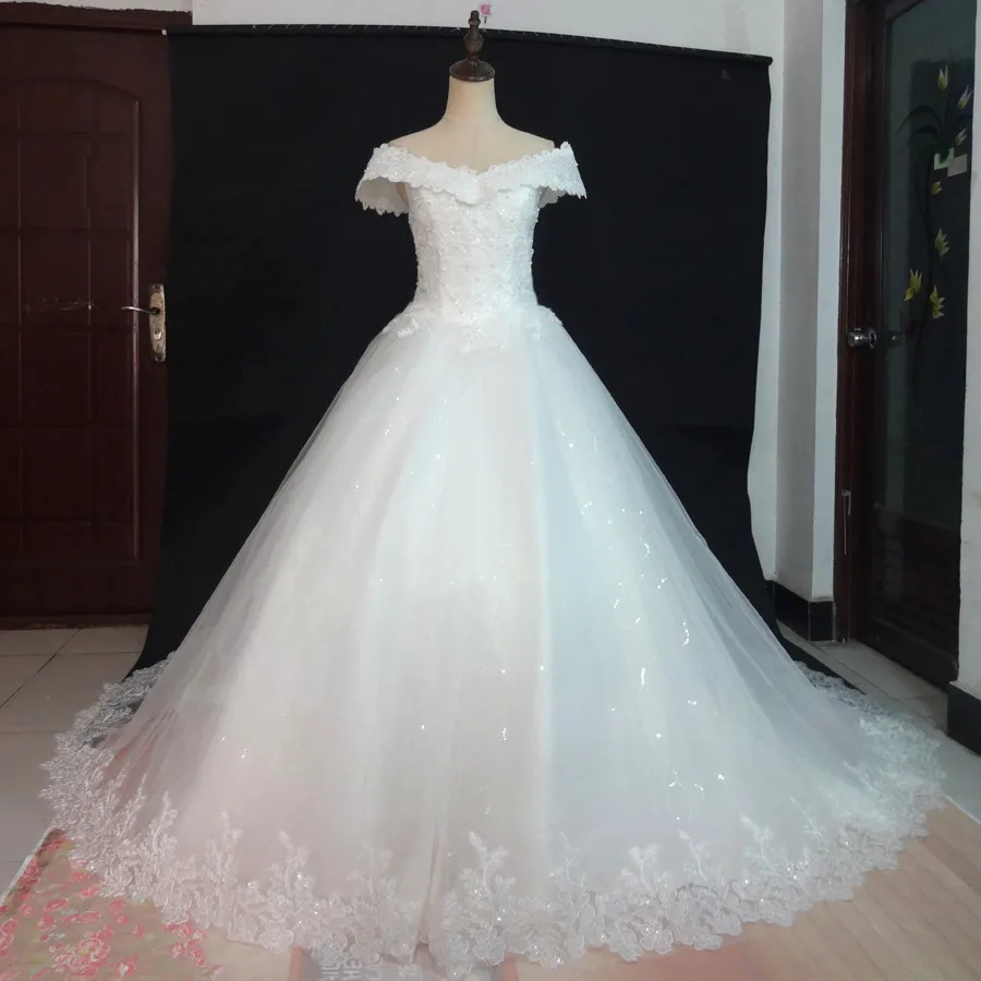 

Real Photos Luxury Bling Wedding Dresses New Arrival Ball Gown Long Tail Ivory Embroidery Lace Edge Short Sleeve