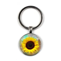 sunflower keychain sun flower glass keychain fashion car keychain metal round glass keychain