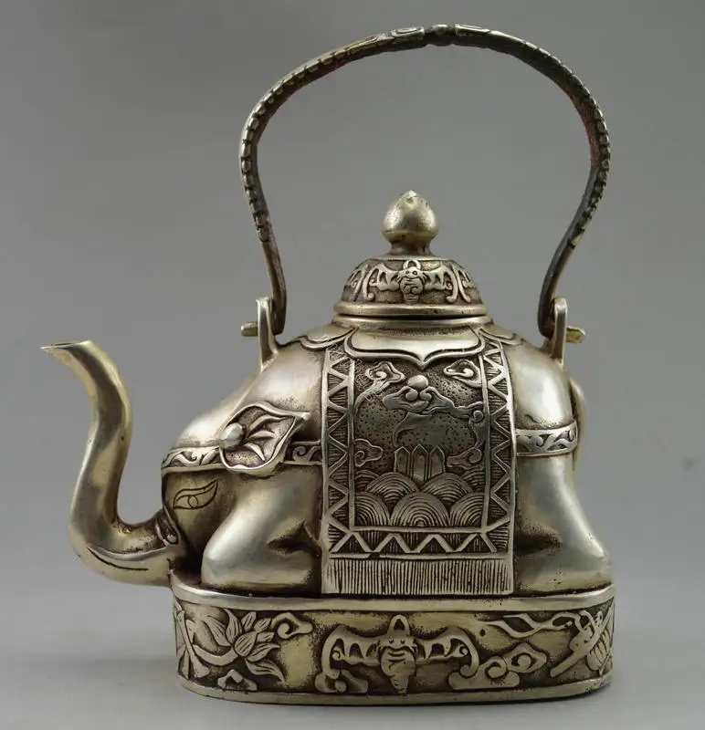 

Elaborate Chinese Collectible Decorated Old Handwork Tibet Silver Carve Flower Elephant Tea pot