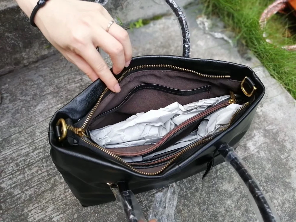 

XHTY leather handbag handbag soft leather shoulder slung quality first layer cowhide woven original design free postage