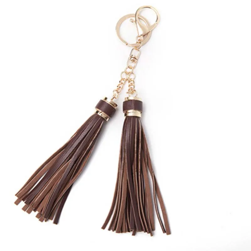 Двухцветная шелковая лента брелок с кисточками серебряный цвет маленький резной