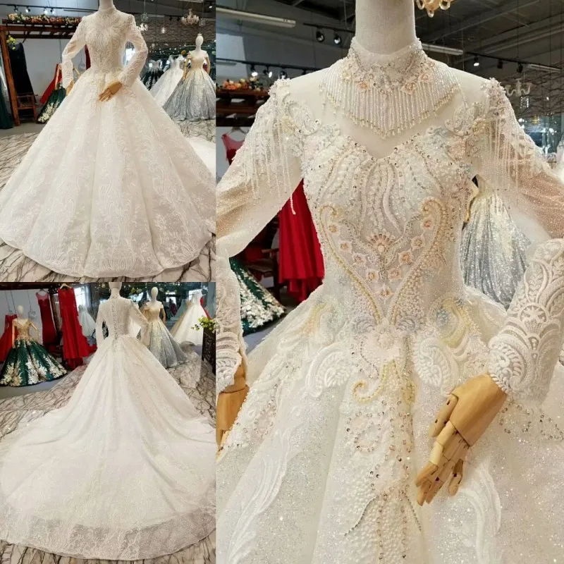 Винтажное бальное платье с жемчугом и кисточками королевским шлейфом