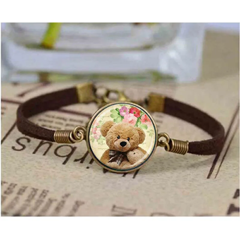 Ювелирные изделия медведь Тедди с маленьким мишкой цветочным фоном