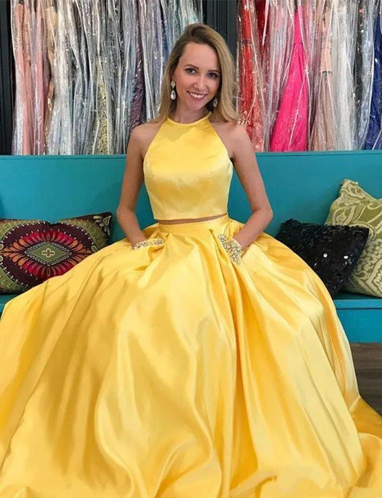 Женское вечернее платье с открытой спиной желтое из 2 частей бусинами и карманами