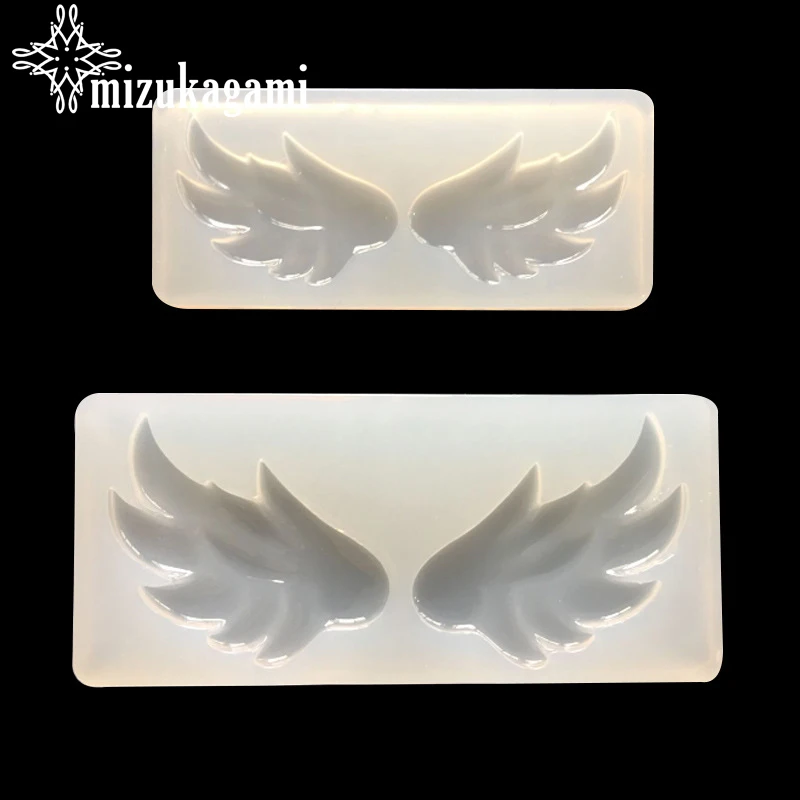 

2pcs/lot UV Resin Jewelry Liquid Silicone Mold Wings White Resin Molds Charms For DIY Handwork Jewelry Finding Accessories