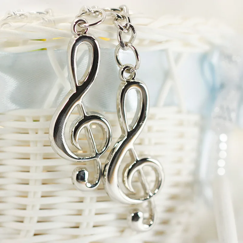 

Free shipping Silver Plated Musical Note Key chain For Car Metal Music Symbol Key Ring Keychain For Men Women Trinket