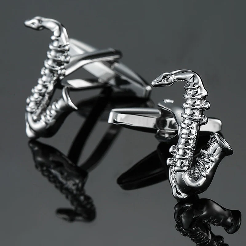 Free delivery high quality copper material cuff links new fashion silvery music Sax for men's wedding gifts. | Украшения и