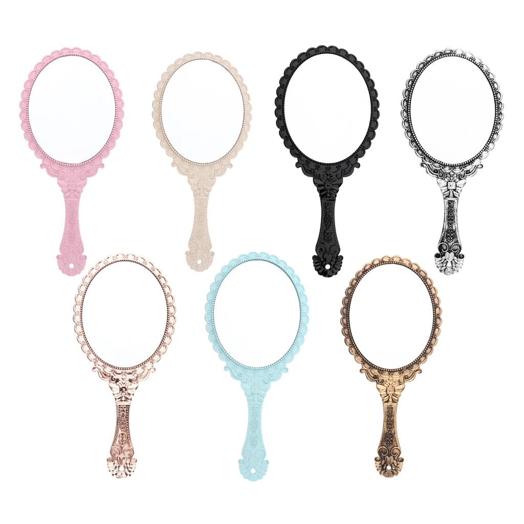 Старинное винтажное пластиковое овальное портативное зеркало с ручкой