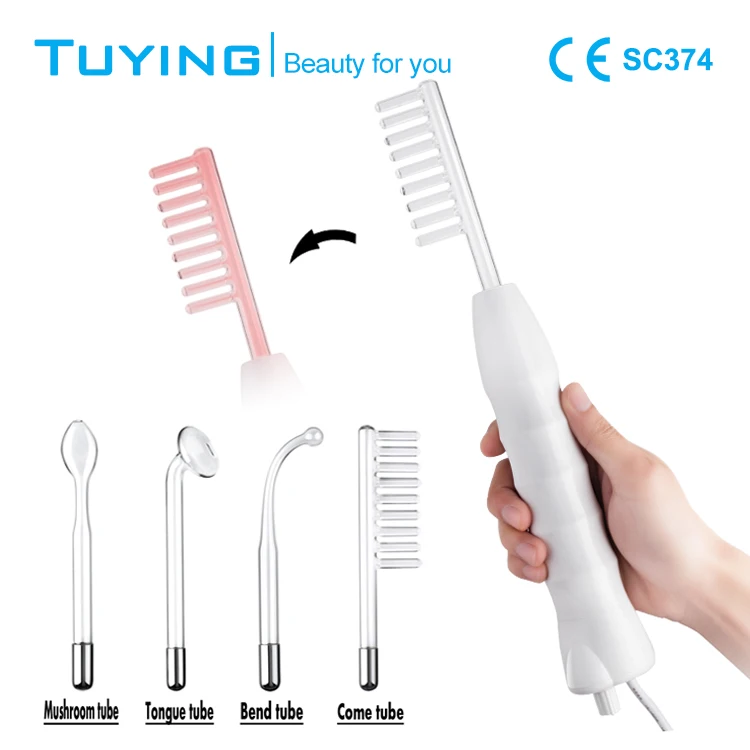 

Holding a high frequency ozone therapeutic apparatus red light portable 4 in 1 body massager