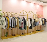 golden display rack for clothes rack in zhongdao clothing store display rack for womens clothes store with landing personality