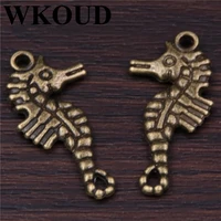 wkoud 20pcs antique bronze color sea horse sea creature hippocampus charm pendant fit jewelry making a279