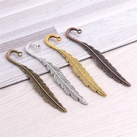 sweet bell 20 pcs 1279 mm four colors fashion classics feather shape two color lead free metal alloy bookmark 13c1643