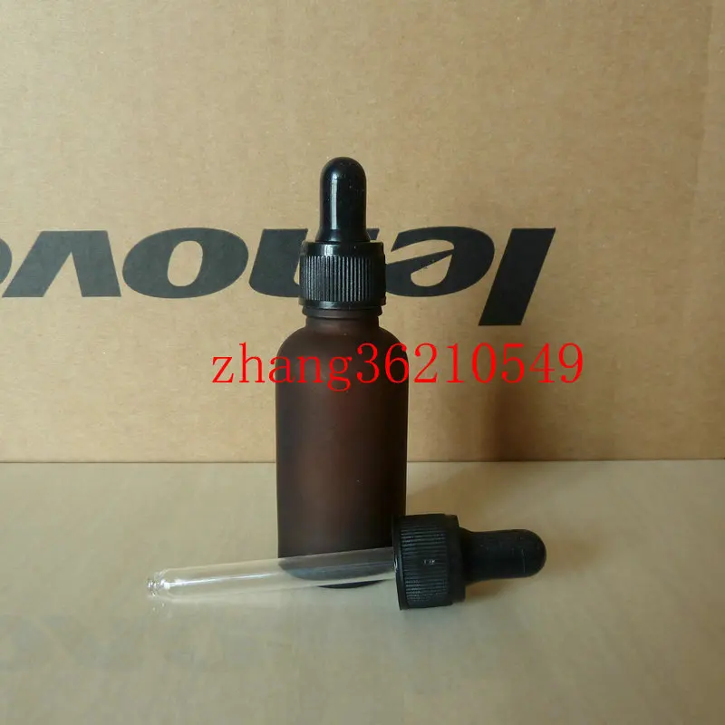 Бутылка для эфирного масла из коричневого/янтарного матового стекла с черной