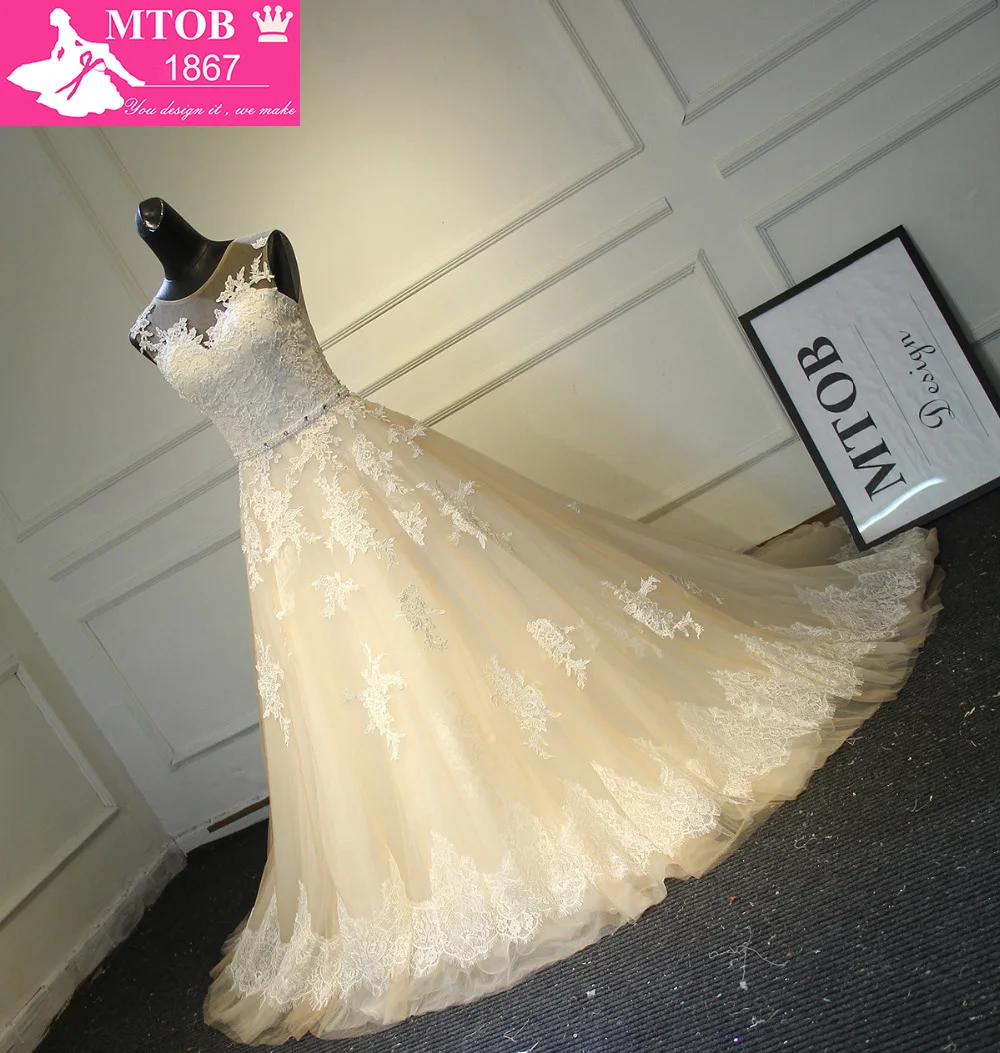 Кружевное свадебное платье трапециевидной формы романтичное без спинки