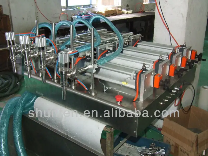 Безоплатная доставка. Полуавтоматическая машина для наполнения медом с четырьмя головками (Жидкостной наливной аппарат с четырьмя головками для жидкостей, аппарат для налива масла).