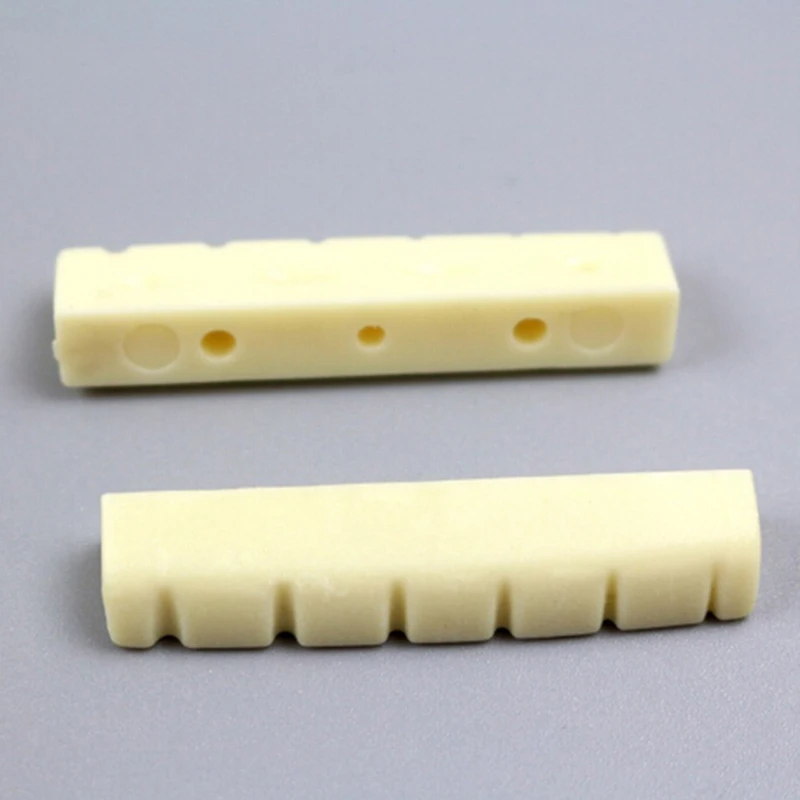 

4Pieces/set Unbleached Curved Slotted guitar Bone Nut Flat Bottom For Strat