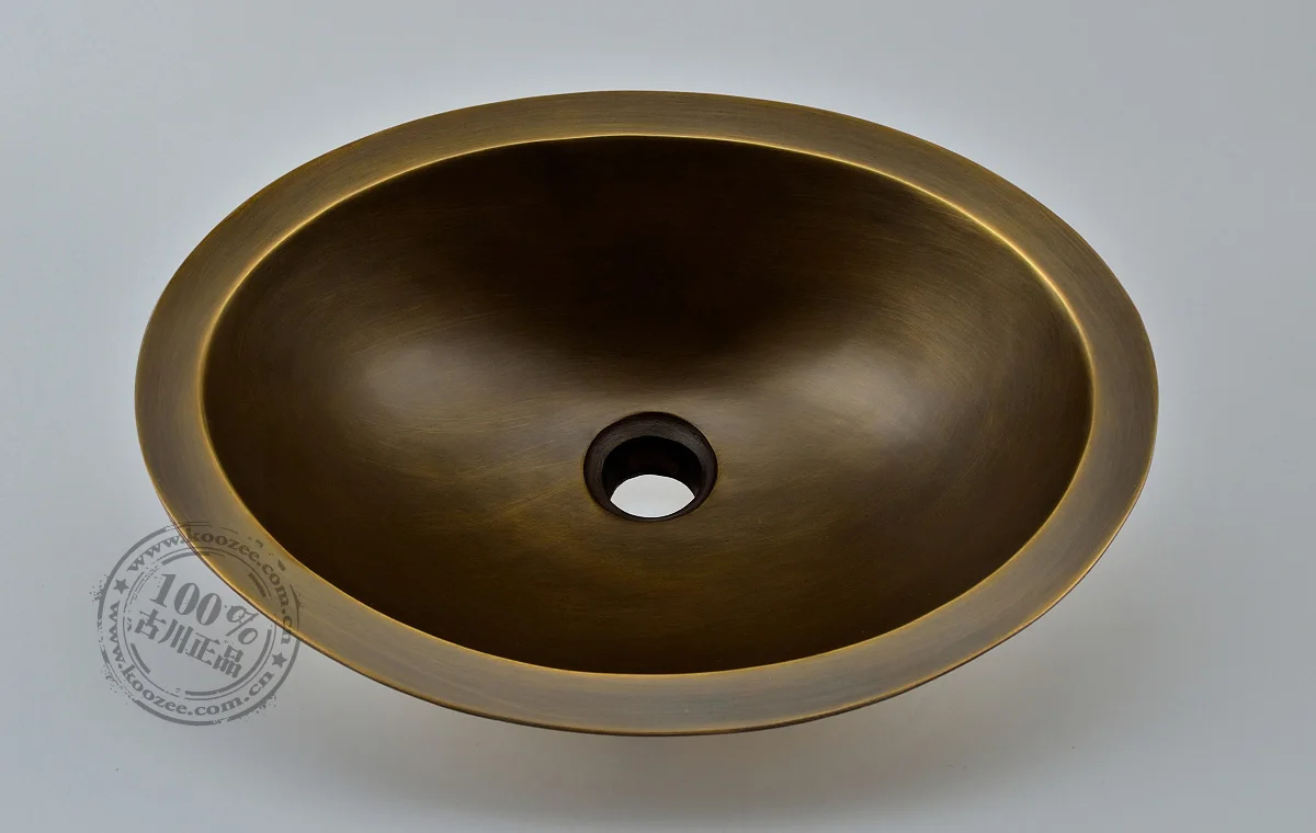 Умывальник бронза. Раковины круглые бронза. Бронзовая раковина. Раковина из латуни. Раковина круглая нержавейка неровная kohler.