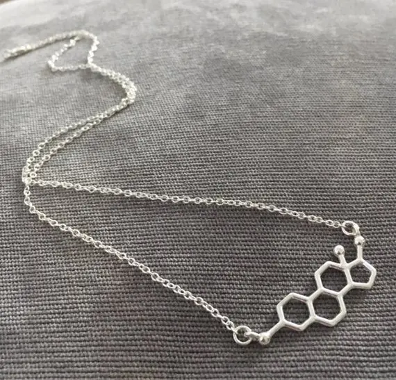 Химическая молекула эстрогена ожерелья структура науки химия геометрические