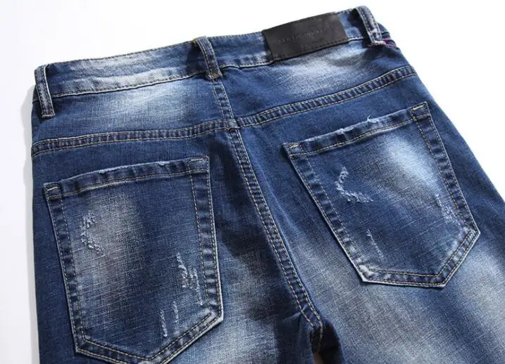 Джинсы мужские с вышивкой штаны из денима дырками байкерские модные