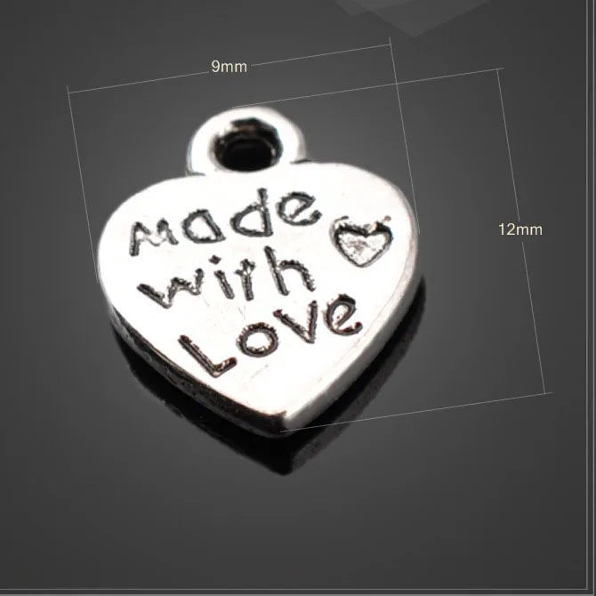 

Лидер продаж, серебристое металлическое ожерелье с подвеской в виде сердца, 12 шт./лот, 9 мм * 12 мм, для изготовления ювелирных изделий