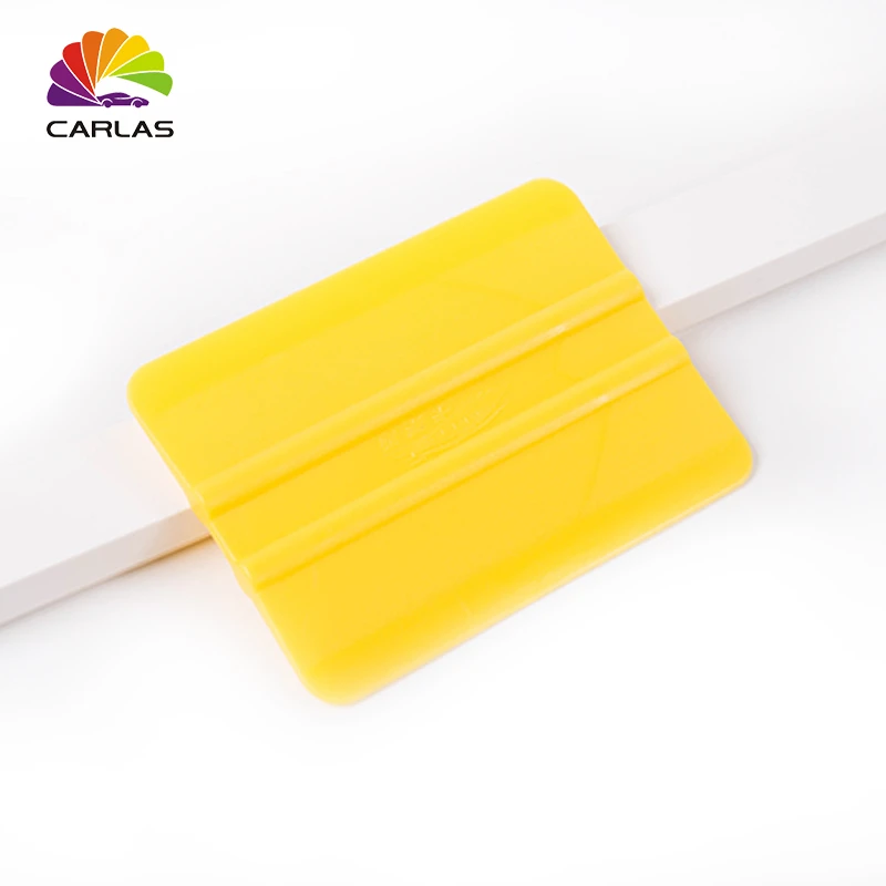 Виниловая плёнка для автомобиля желтый скребок чистки