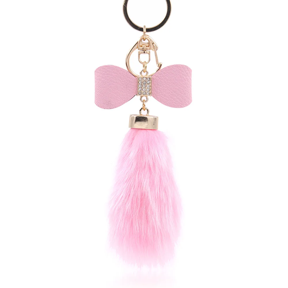 Кожаный брелок с бантом и меховым шариком аксессуар для сумки кристаллами