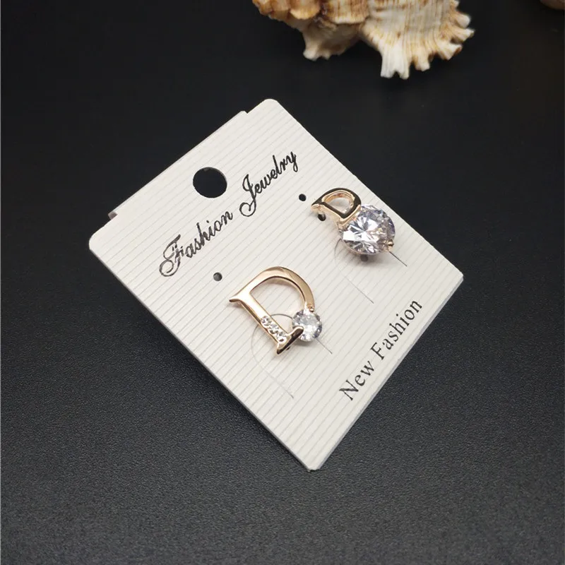 Серьги женские из натурального розового золота с цирконием фирменный дизайн