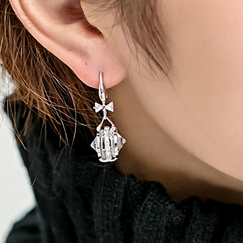 Корейские серьги подвески нового дизайна с большим кристаллом колесом и бантом