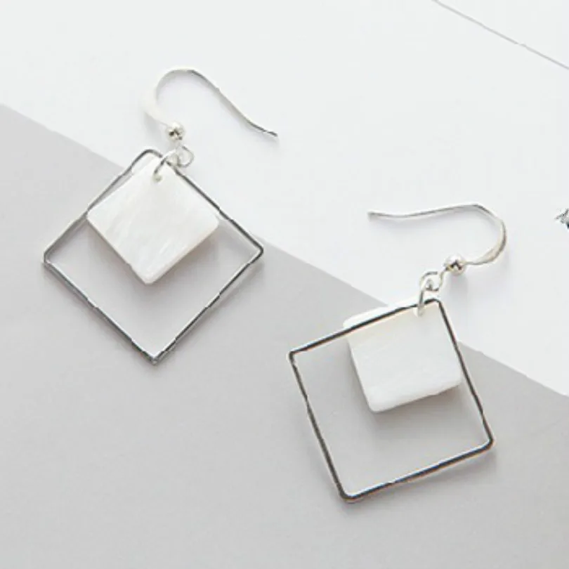 Простые треугольные серьги в европейском и американском стиле модные