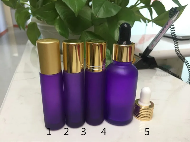 

100pcs*10ml frosted purple Essential Oil Bottles with Glass Roller Balls Aromatherapy travel Perfumes bottles with Plastic lids