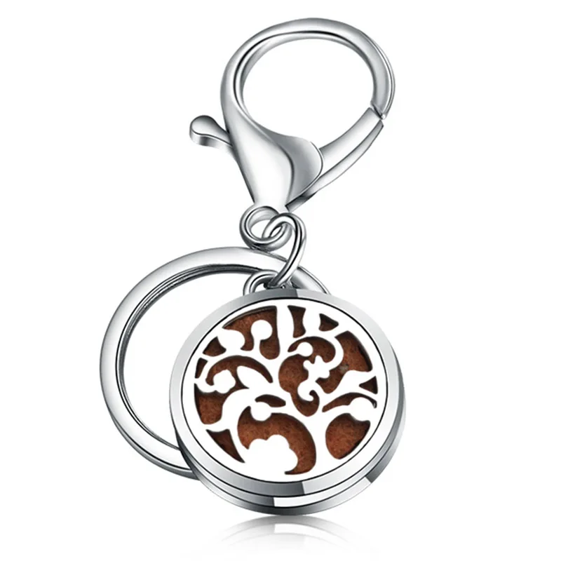 

DIY Perfume Key Chain Jewelry 361L Stainless Steel Essential Oil Diffuser Perfume Aromatherapy Locket Saplings Key Chain Jewelry