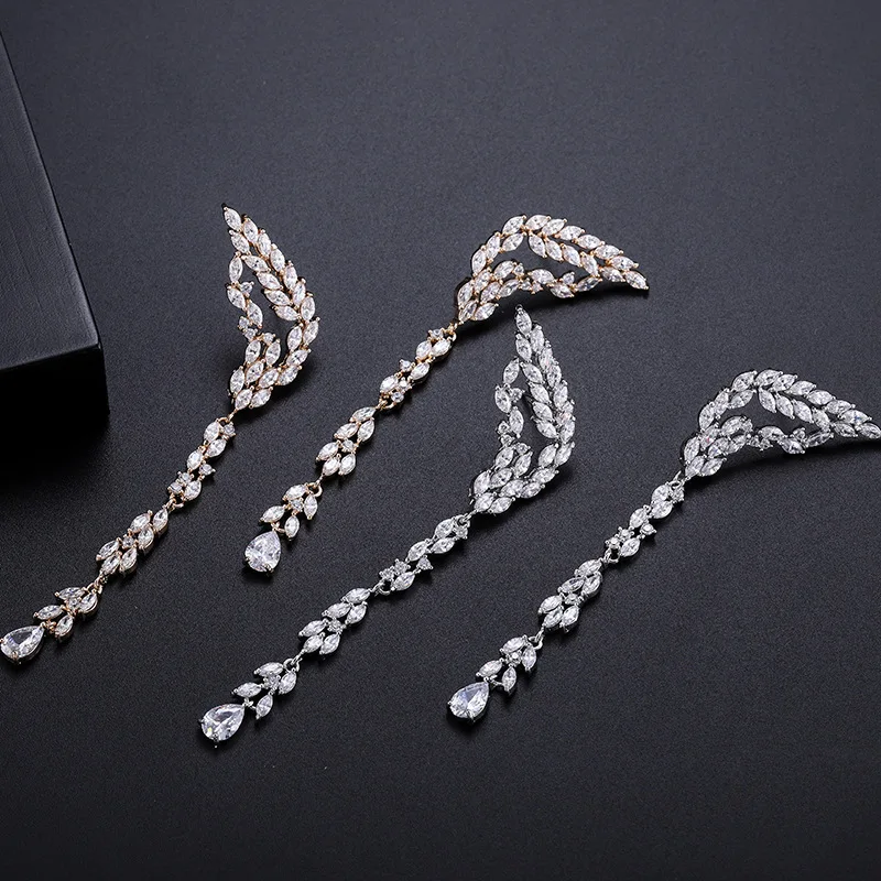 Серьги-подвески женские в форме крыльев птицы с фианитами | Украшения и