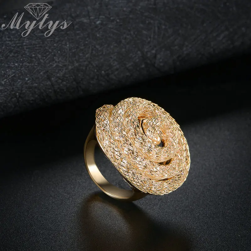 Женское кольцо Mytys закручивающееся в сетку с круглыми кольцами Новое поступление