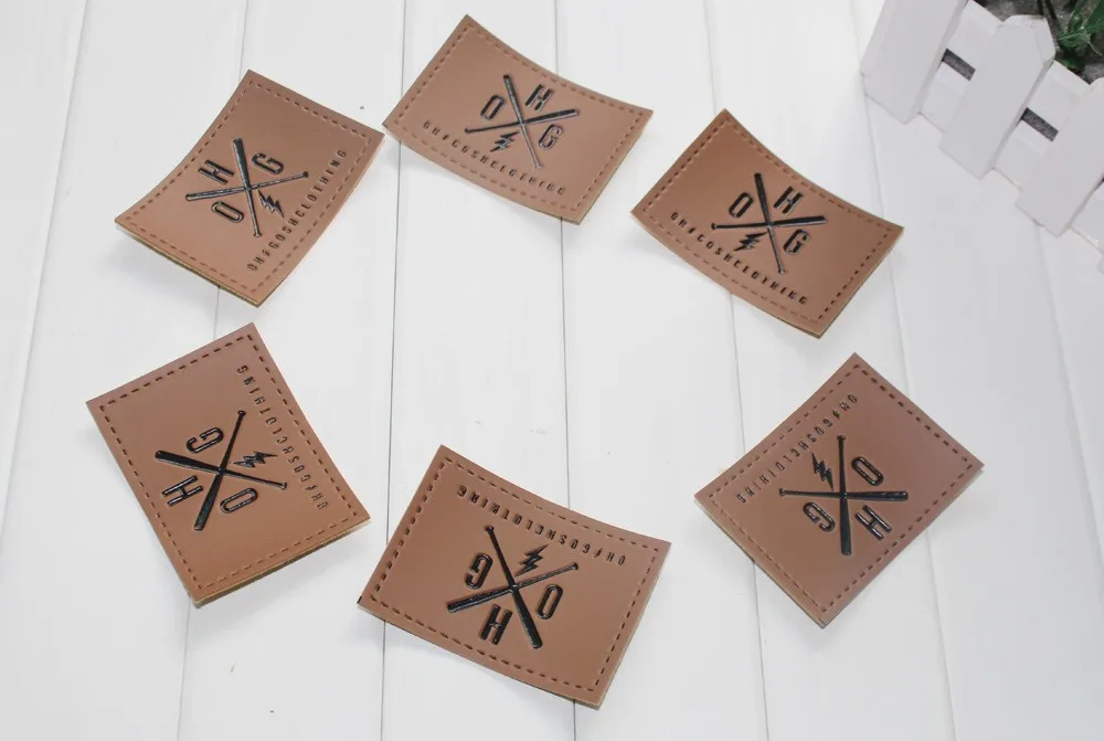 Пользовательские тисненые этикетки из ПУ в основном для джинсов или сумок