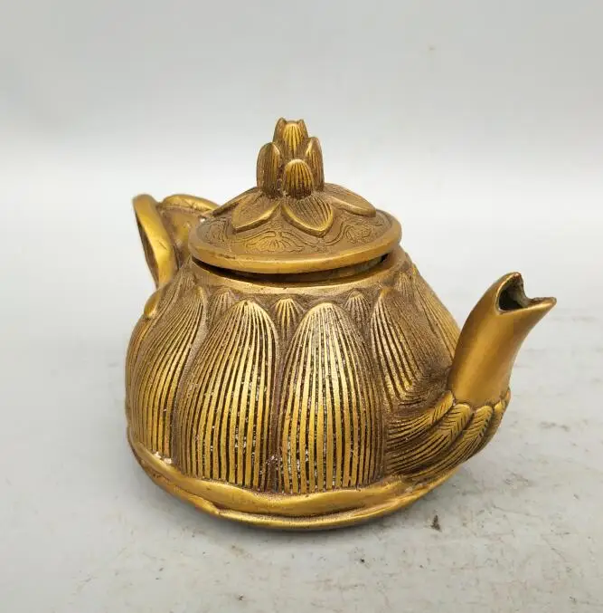 

China collection archaize brass carving lotus teapot statue