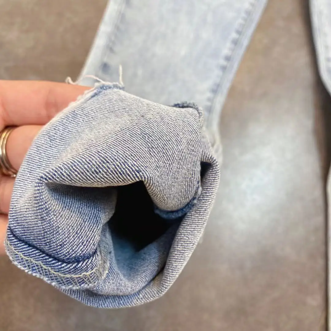 

ZCSMLL 6 Grain Button with Rough Edge, Tight Legs, Big Legs and High Waist women fashion Jeans Spring 2021