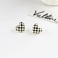 simple three dimensional heart checkerboard earrings black and white check heart earrings