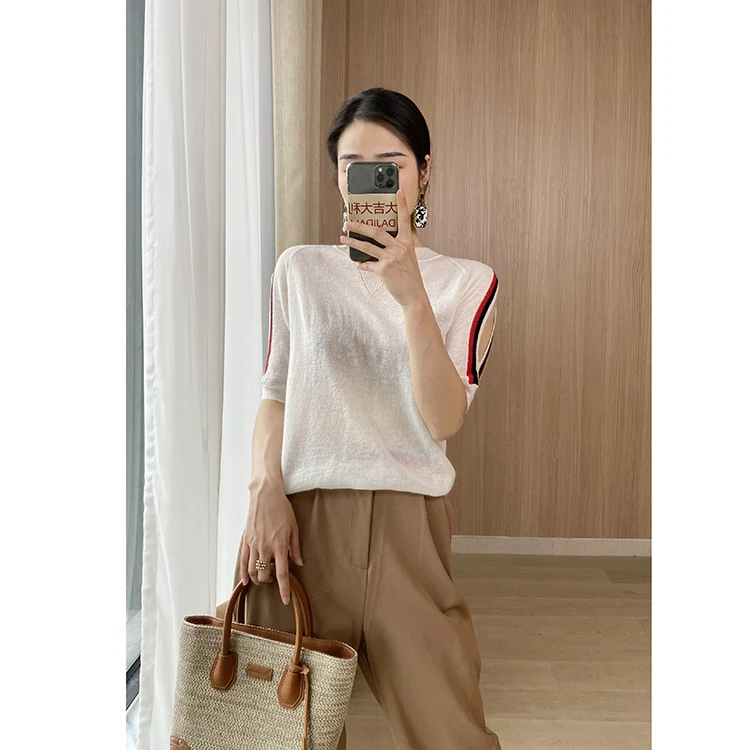

New clothes in the spring of 2020 tender baby muscle in the hollow out sleeve stripe thin sweater female 809 m018