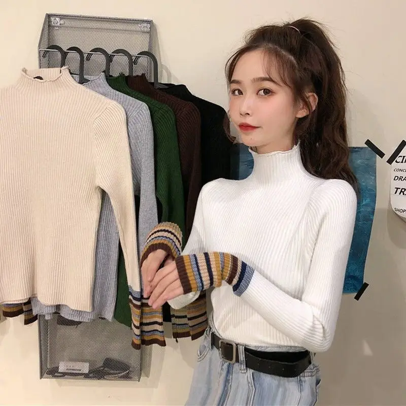 

Autumn and winter new semi high neck thickened black sweater women's exquisite inside with long sleeve heart machine top knitted