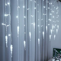 curtain garland on the window christmas lights festoon led lights icicle curtain garlands for new year christmas decoration 2021