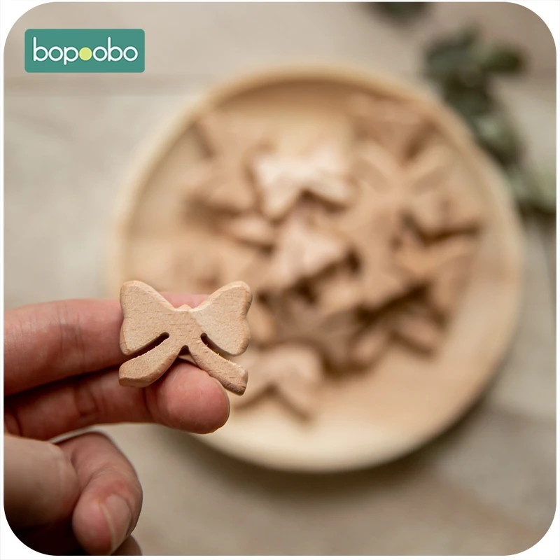 

Bopoobo 100pc BPA Free Wood Teething Bead Bow Shape Beech Beads Baby Teether Wooden Making Pacifier Chain For Newborn