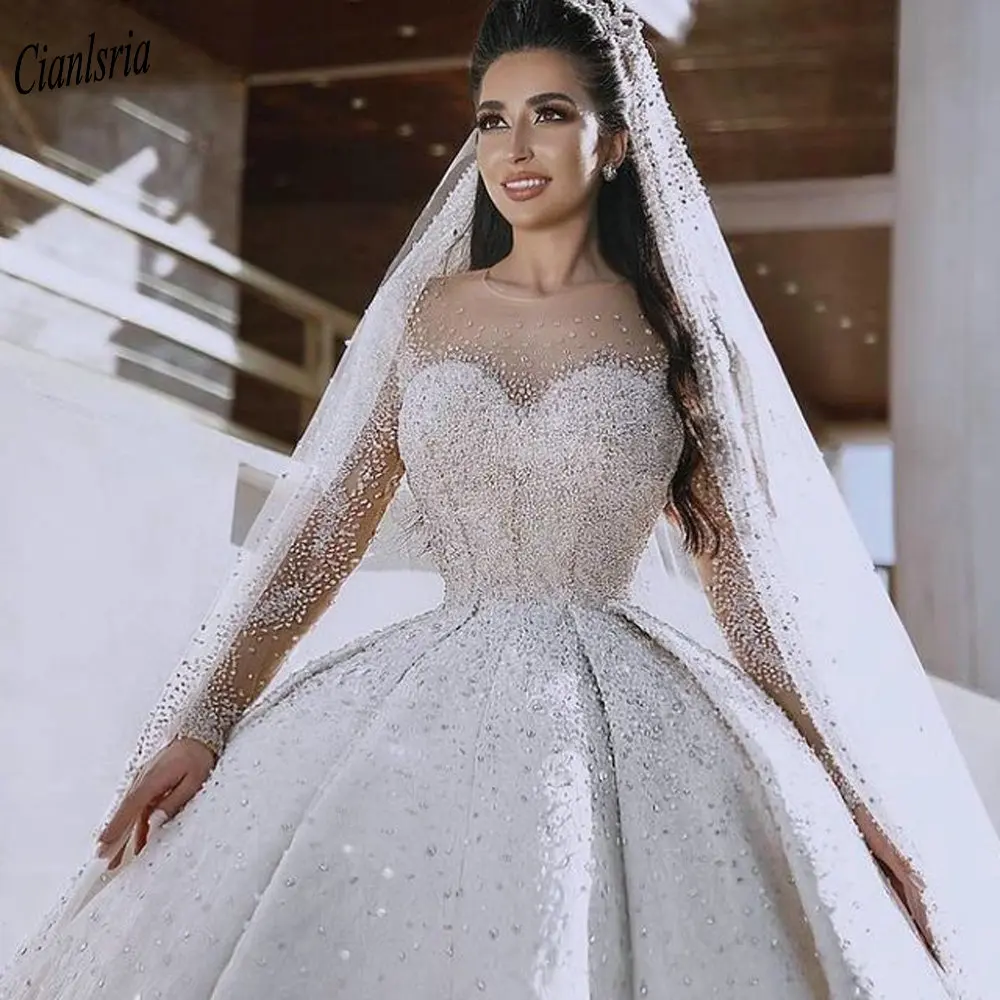 

Luxury Beading Diamonds Long Sleeve Saudi Arabic Ball Gown Wedding Dress O-Neck Illusion Appliques Lace Dubai Bridal Gown