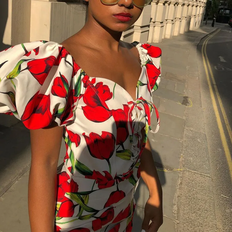 

The new summer print dress with a deep V tie and straps